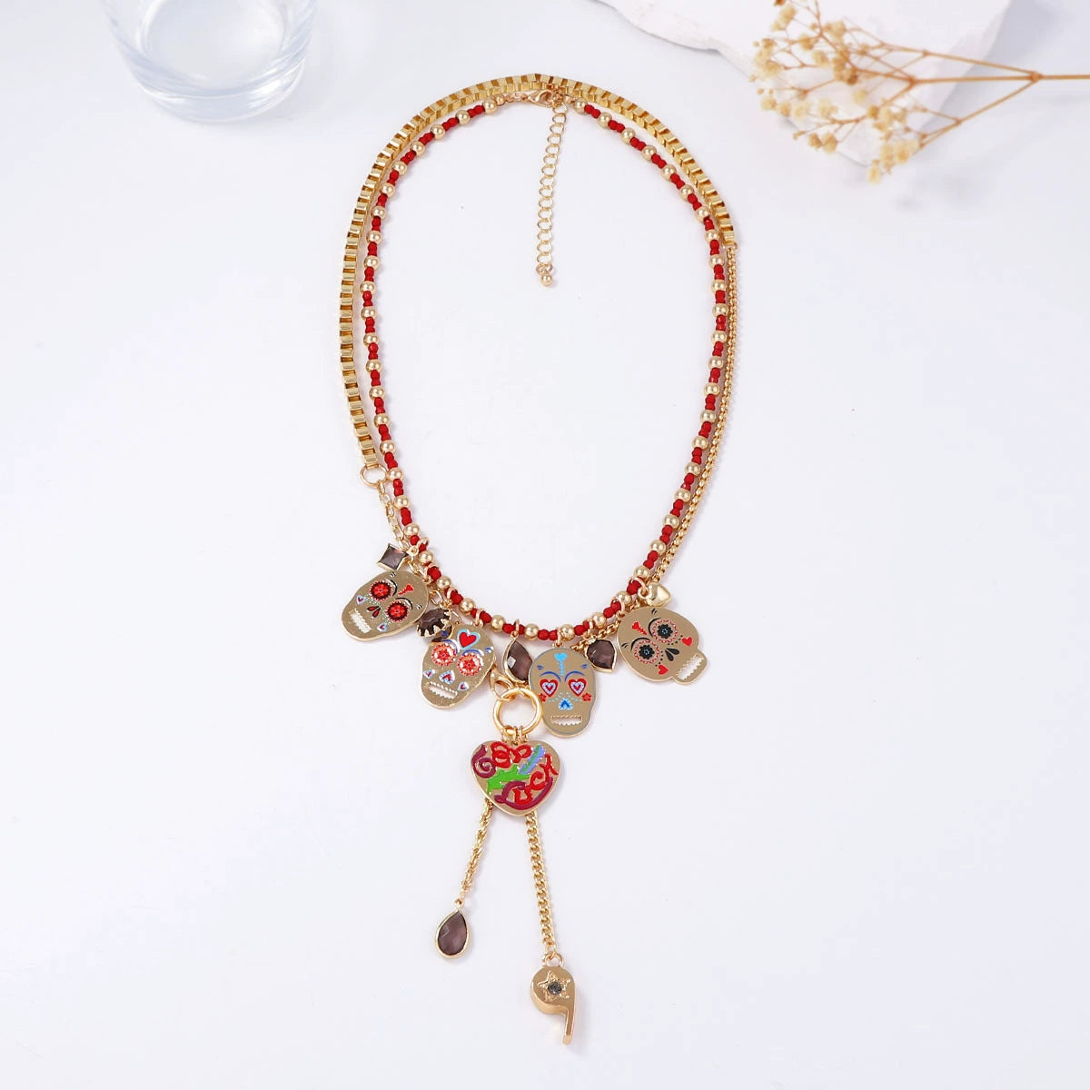 Set of 2 colorful metal skull pendant necklaces