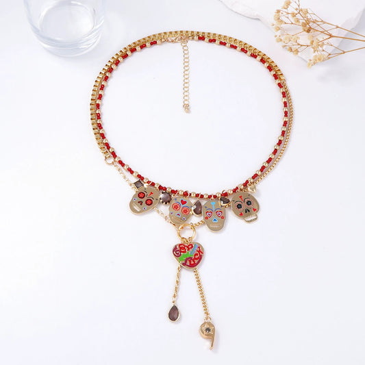 Set of 2 colorful metal skull pendant necklaces