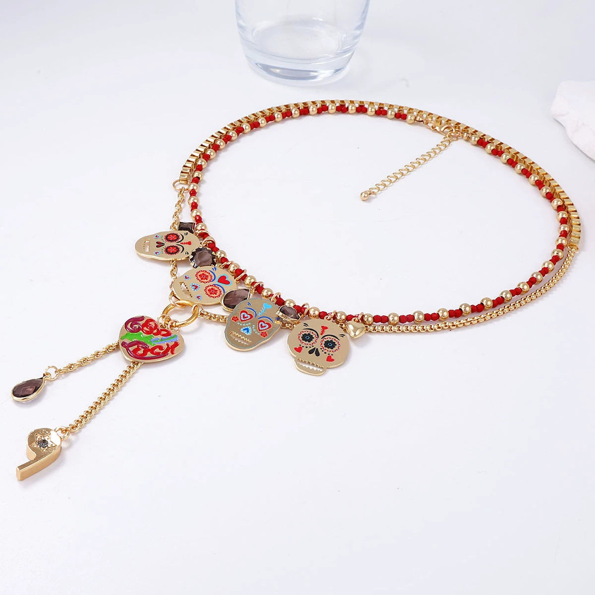 Set of 2 colorful metal skull pendant necklaces