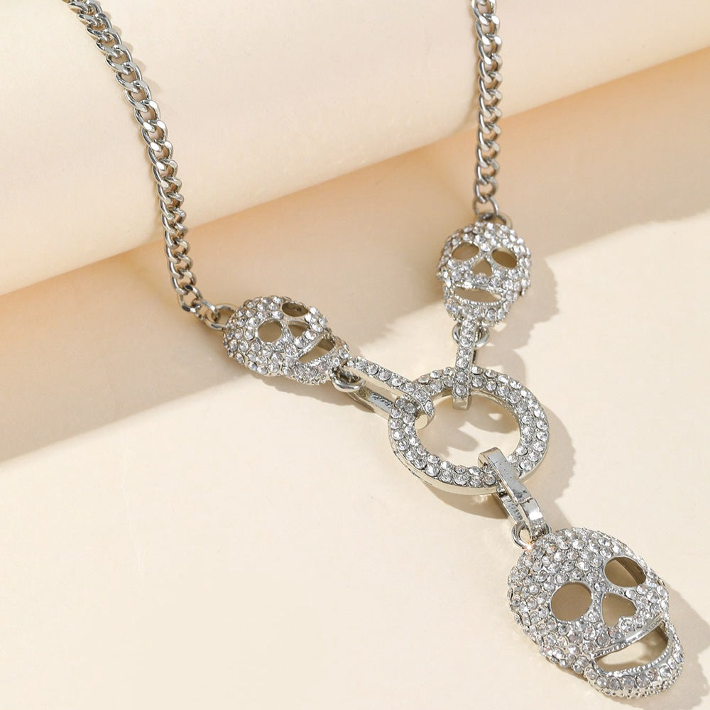 Silver rhinestone skull necklace